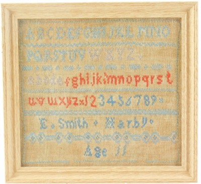 A Victorian alphabetic and numeric sampler by E Smith, aged Eleven, March, 21cm x 23cm. - 2