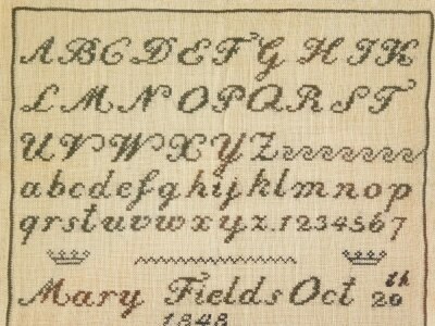 A Victorian alphabetic and numeric sampler by Mary Fields, October 20th 1848, 21cm x 26cm.