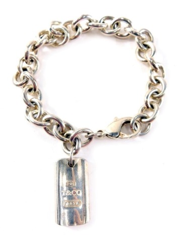 A Tiffany & Co silver bracelet, with ingot drop, 18cm long, 34.8g all in.