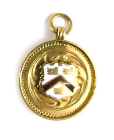 A 9ct gold charity cup fob, with enamel front and plain upper top, dated 1921-22, 4cm high, 4g all in.