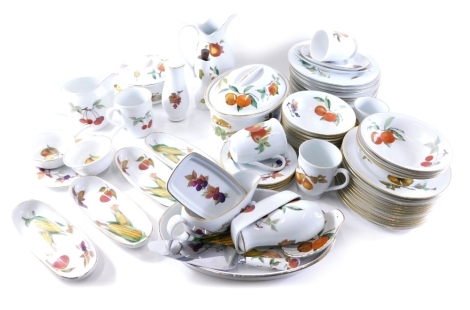 A Royal Worcester Evesham pattern part dinner service, to include tureens, plates, salt and pepper pots, mugs, etc.