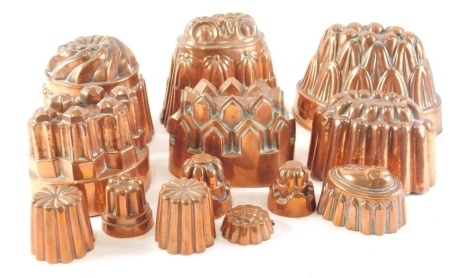 A collection of various copper jelly moulds, various sizes and shapes, to include Benham and Froud.