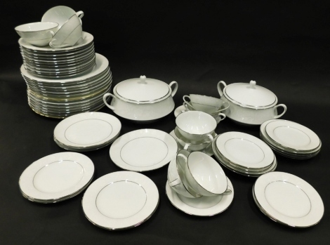 A Noritake Ranier part dinner service, no. 6909, to include dinner plates, 25cm diameter, pair of lidded tureens, cups, saucers, side plates, etc., printed marks beneath. (a quantity)