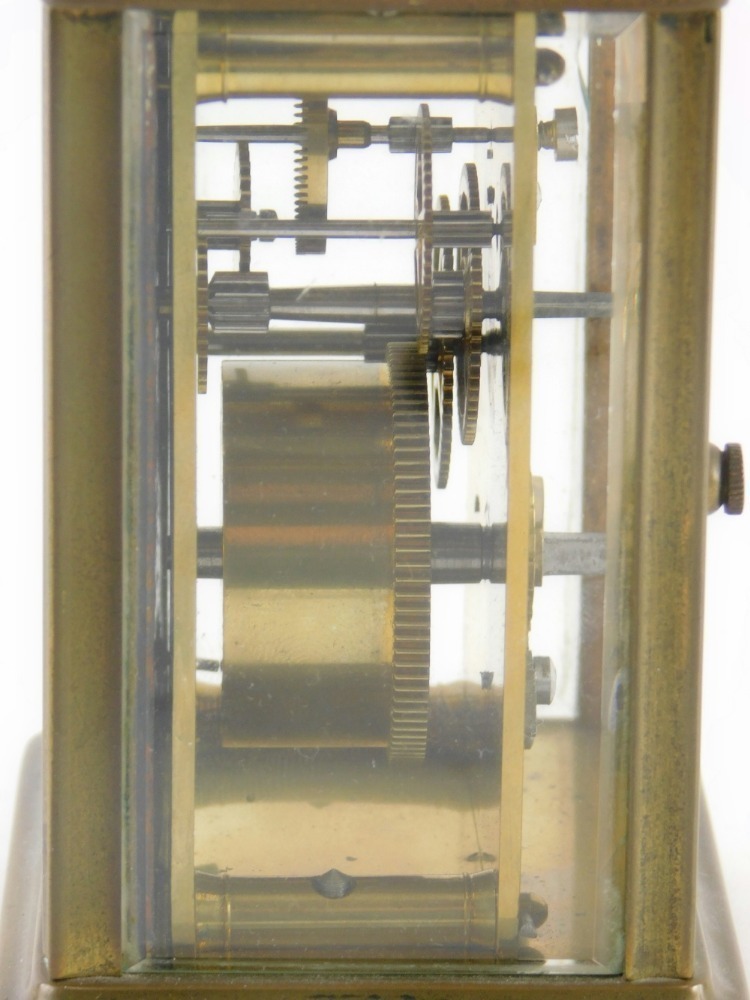 Austin Reed Clock A 20thC Reed & Sons carriage clock, in five part glazed brass case with ...