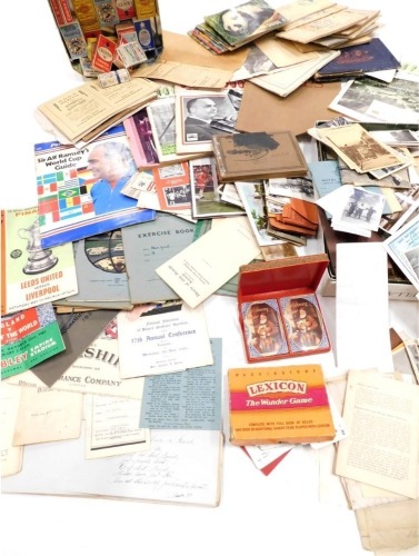 A quantity of ephemera, to include cigarette cards, photographs, football programmes, to include FA Cup Final Leeds United vs Liverpool 1965, a photographic postcard of Derry Thomson, a boxer, etc.