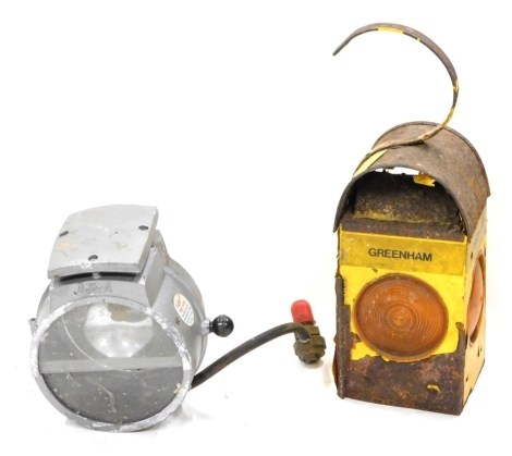 A Greenham Railway lantern, in domed case with hook top partially painted in yellow, 46cm high, and a Bullfinch mini flood light in metal casing.