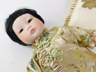 A Franklin heirloom doll, The Imperial Chinese Baby Doll, with accessories and paperwork, 46cm high. - 2