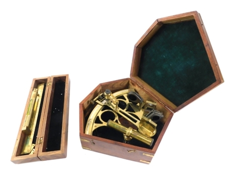 A brass Cassen & Plath sextant, with wooden handles in fitted case, 27cm wide, and a cased spirit level ruler. (2)