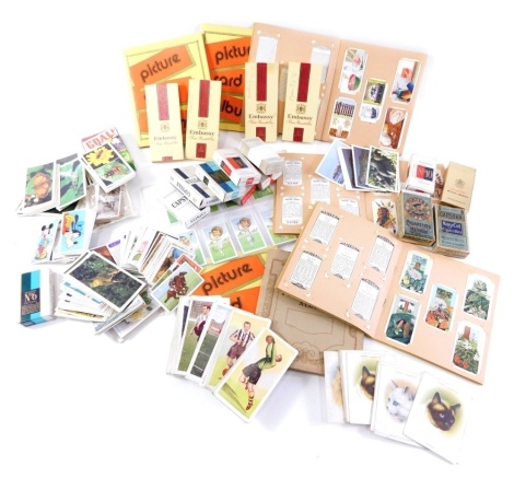 Various cigarette trade and other cards, Texaco Trophy cricket cards, various picture card albums containing a quantity of Players cigarette cards, Straight Line Caricatures, Will's cigarettes, Flowers, Brooke Bond Queen Elizabeth II cards, etc. (a quanti