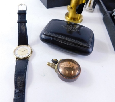 A Victorian papier mache snuff box, 10cm wide, an Accurist wristwatch, a brass table microscope, and a brass penny lighter, four draw telescope, a Mercer gauge, an Ultra lens, etc. (a quantity) - 4