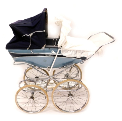 A 20thC Silver Cross pram, with chrome handle, turned grip, adjustable canopy in blue, with chrome frame, two size wheels and basket beneath, 90cm high.