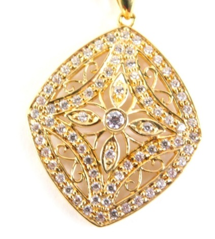 A 9ct gold fancy link chain, 60cm long, 7.4g, and silver gilt cz set basket pendant, 3cm high.