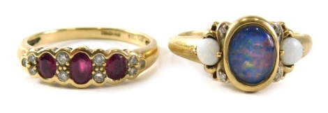 Two 9ct gold dressings, comprising an opal duplet cluster ring, ring size S½, and a 9ct gold garnet and diamond half hoop dress ring, ring size S 6.4g all in. (2)