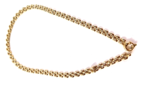 A three row necklace of articulated brochette type design, with circular clasp, yellow metal stamped 375, 46cm long, 17.6g.