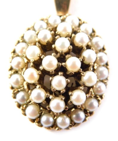 A Victorian style pearl pendant and chain, the oval pearl of three layered design, with adjustable clasp, yellow metal, unmarked, 3cm high, on a later 9ct gold chain, 9.7g all in, boxed. (AF)