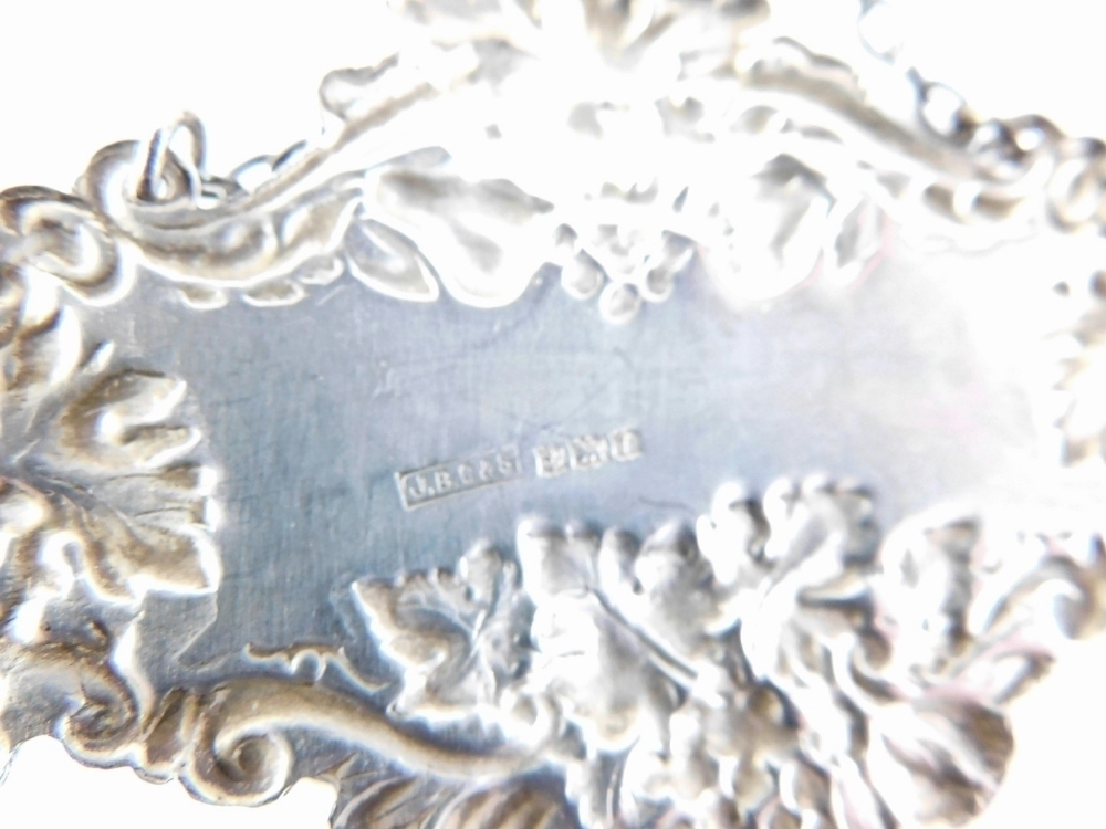 A set of three Elizabeth II silver decanter labels, for port, whisky