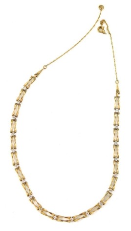 A cz set necklace, of two bar twist design, on design link clasp, yellow metal stamped 9ct, 40cm long, 4.9g all in.