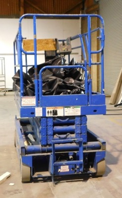 An access working platform scissor lift. VAT is also payable on the hammer price of this lot. - 2