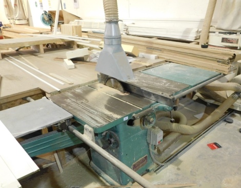 A Wadkin Bursgreen circular saw bench and extension bed, three phase. VAT is also payable on the hammer price of this lot.