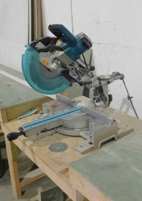 A Makita DXT chop saw, 30cm blade, single phase and benches. VAT is also payable on the hammer price of this lot. - 2