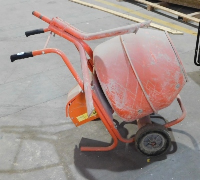 A portable concrete mixer and stand, 110 volt. VAT is also payable on the hammer price of this lot.