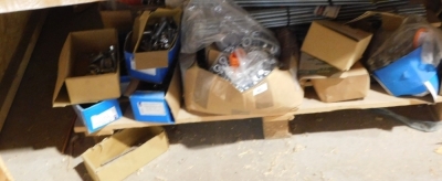 A pallet load of threaded steel bar, nuts, bolts and other ironmongery. (all under work bench) VAT is also payable on the hammer price of this lot. - 2