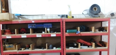 Two red steel part racks and including the residual contents, being various tools, staple guns, etc. VAT is also payable on the hammer price of this lot.