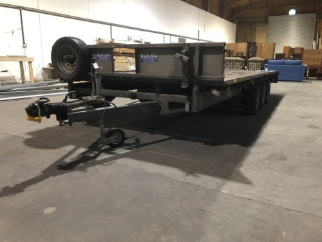 A Ifor Williams three axle low load flat bed trailer, with sides and rear, 2.25m wide, 5.5m long. For Sale by TENDER, final bids to be submitted by 9am Thursday 17th. VAT is also payable on the hammer price of this lot.