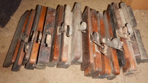 Sixteen Victorian moulding planes.