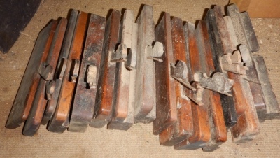 Sixteen Victorian moulding planes.