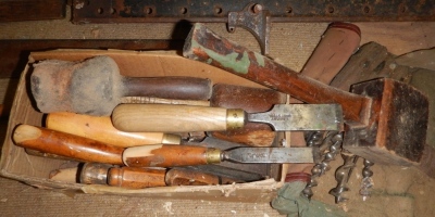 A collection of chisels, mallets and wood drills. - 2