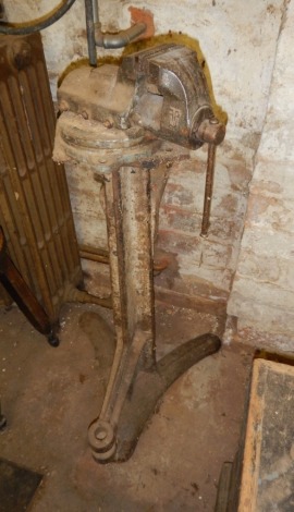 A engineer's vice on iron framed stand.