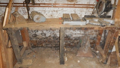 A timber work bench, 175cm wide.