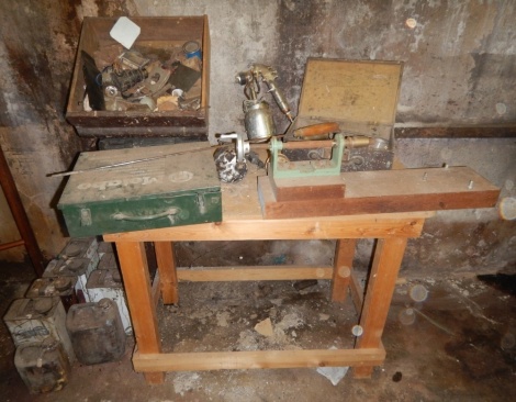 Two work benches, and sundry equipment and tools.