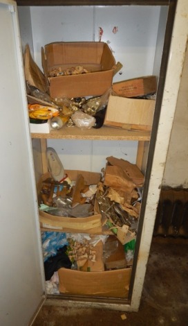 A steel cabinet and contents of numerous coffin furnishings.