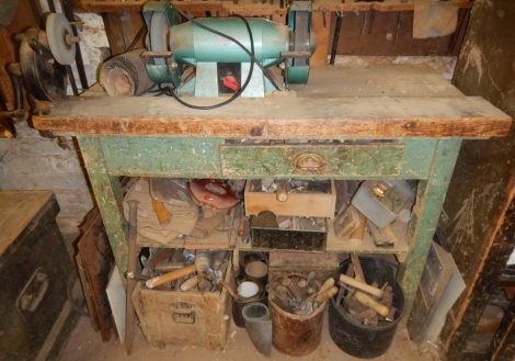 An old pine work bench fitted a drawer, electric and manual grinder and contents of drawer, (does not include the items below the bench), 120cm x 62cm x 89cm.