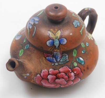 Two miniature teapots, comprising a Chinese Yixing example, decorated in enamels with flowers and butterflies, 4cm high, (AF), and a Japanese Nippon moriage decorated teapot, 5cm high. - 15