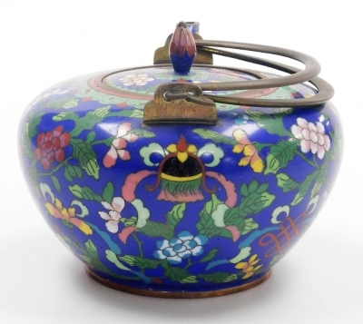 A late 19thC Chinese cloisonne teapot, with double loop brass handle, decorated with flowers and precious objects on a blue ground, 19cm wide. - 12