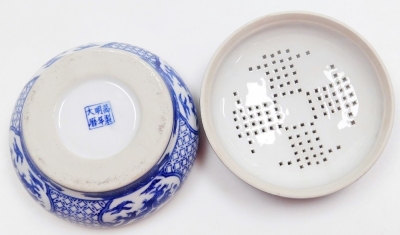 A Chinese Republic blue and white porcelain potpourri bowl and cover, decorated with reserves of dragons chasing flaming pearls, bears six character Wanli mark, 13cm wide. - 13