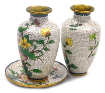 Three items of Chinese cloisonne, comprising a pair of vases and a plate, each decorated with flowers and birds on a white ground, vases 20.5cm high, plate 18cm diameter. - 11