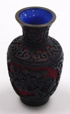 A group of Oriental items, to include a floral display with enamelled flowers in a cloisonne planter, 12cm high, a Chinese carved urn and cover, 13cm high, a cast metal figure of a child in kimono, gilt heightened, 26cm high, etc. - 15