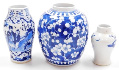 A Qing dynasty blue and white Chinese porcelain ginger jar, decorated with prunus blossom on a cracked ice ground, four character Kangxi mark, 14cm high, a 19thC blue and white porcelain vase decorated with reserves of figures on a floral ground, four ch - 10