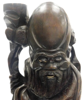 A Chinese hardwood figure of the god Shou-Lau, god of longevity, with wire work inlay, modelled standing holding a staff and a gourd, formerly a lamp base, 54cm high. - 12