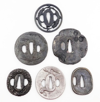 Six Japanese tsuba, of varying shapes and designs, depicting dragon, waves, blossom, etc., 7.5cm diameter. - 4