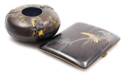 A Japanese iron cigarette case, inlaid in gold and silver with birds on branch, seal mark to interior, 7cm wide, and a Japanese bronze pot, of squat cylindrical form, decorated with figures and monkey in relief, gilt heightened, 7.5cm diameter, both Meiji - 10