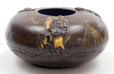 A Japanese iron cigarette case, inlaid in gold and silver with birds on branch, seal mark to interior, 7cm wide, and a Japanese bronze pot, of squat cylindrical form, decorated with figures and monkey in relief, gilt heightened, 7.5cm diameter, both Meiji - 14