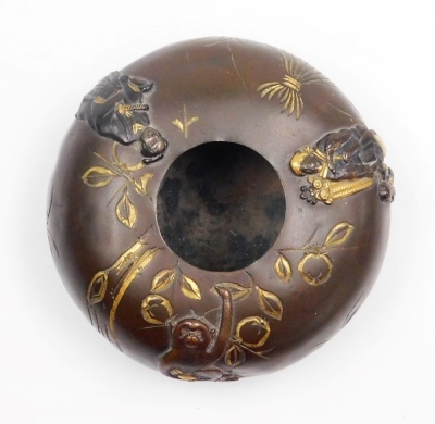 A Japanese iron cigarette case, inlaid in gold and silver with birds on branch, seal mark to interior, 7cm wide, and a Japanese bronze pot, of squat cylindrical form, decorated with figures and monkey in relief, gilt heightened, 7.5cm diameter, both Meiji - 17