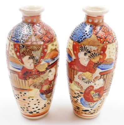 A pair of early 20thC Japanese Satsuma vases, each of baluster form with applied dragon handles, decorated with figures to both sides, marked Dai Nihon Satsuma to underside, 19.5cm high, together with another pair of Satsuma vases of cylindrical tapering - 26