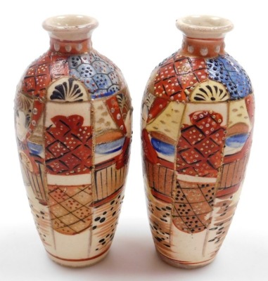 A pair of early 20thC Japanese Satsuma vases, each of baluster form with applied dragon handles, decorated with figures to both sides, marked Dai Nihon Satsuma to underside, 19.5cm high, together with another pair of Satsuma vases of cylindrical tapering - 29