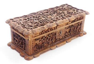 A 20thC Chinese Canton hardwood box, of rectangular shaped form, profusely carved with figures, buildings, trees, etc., the hinged lid enclosing a vacant interior, 25cm wide. - 9